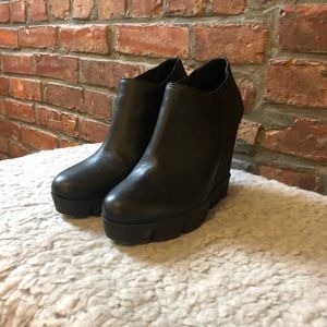 Pollini black wedge booties